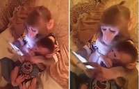 Macaca cuida de filhote enquanto mexe em celular. Veja o vídeo!