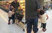 Americano faz compras com menina presa ao carrinho pelos cabelos