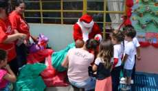 Reserva do Iguaçu - Papai Noel dos Correios distribui presentes e desperta alegria em crianças