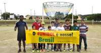 Reserva do Iguaçu - Meninos da escolinha de campo conhecem o Funibol, o esporte reservense